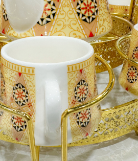 طقم فناجيل 6 حبة مع ابريق سيراميك مع استاند معدني لون ذهبي