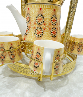 طقم فناجيل 6 حبة مع ابريق سيراميك مع استاند معدني لون ذهبي