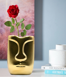 مزهرية ذهبي على شكل وجة مزهرية ذهبي على شكل وجة