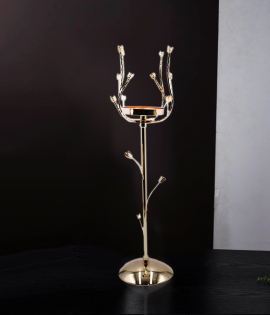 شمعدان معدن لون ذهبي