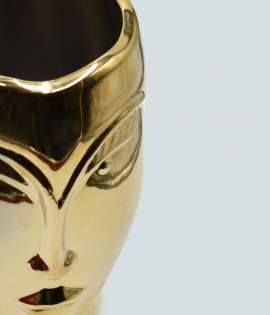 مزهرية على شكل وجه لون ذهبي